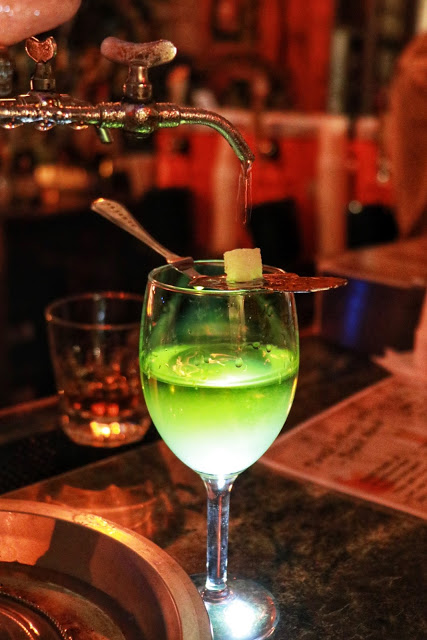 What to do on an Austin to New Orleans road trip: Absinthe at Pirates Alley