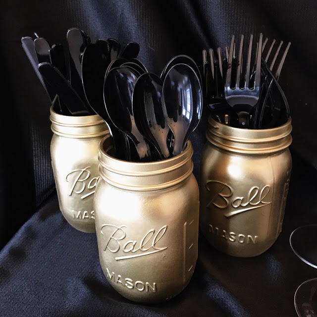 easy decor idea for an awards show party or oscar party: diy gold spray painted mason jars
