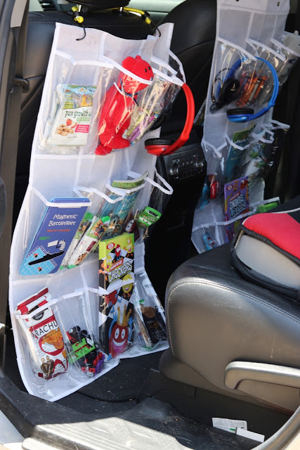 Super Easy DIY Hanging Organizer for Your Next Family Road Trip - Fab  Everyday