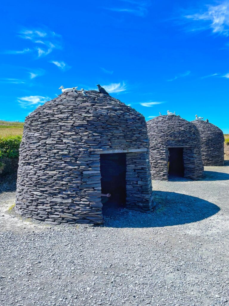Recreation of the monastery beehive huts on Skellig Michael at the Kerry Cliffs, one of the Ring of Kerry highlights