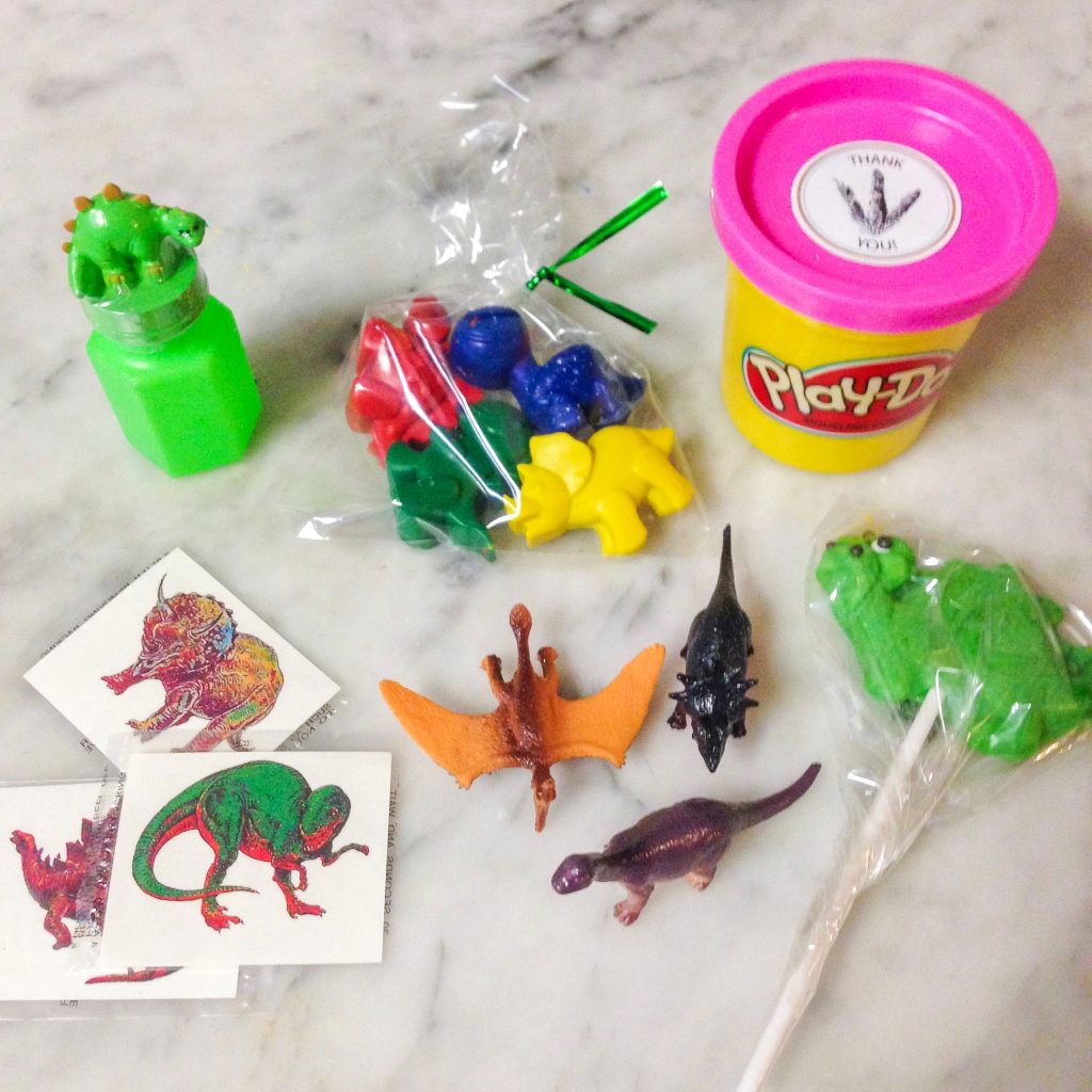 what to put in dinosaur treat bags for a dinosaur birthday party