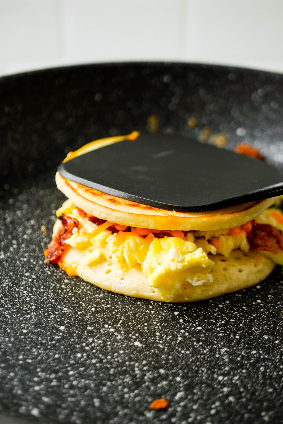 grab and go breakfast sandwich recipe: bacon egg and cheese pancake sandwich 