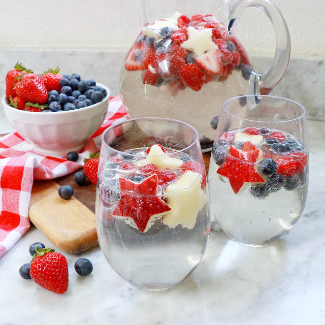 Patriotic cocktail: red white and blue wine spritzer