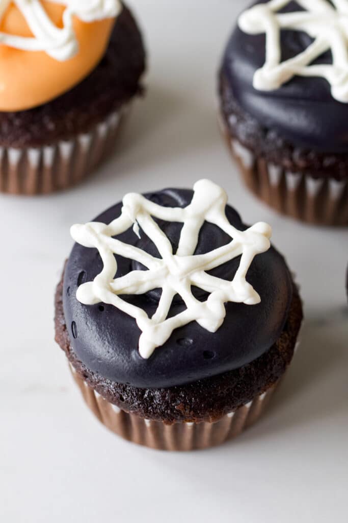 Easy Halloween Cupcake Ideas: Candy Melt Spiderweb Cupcakes