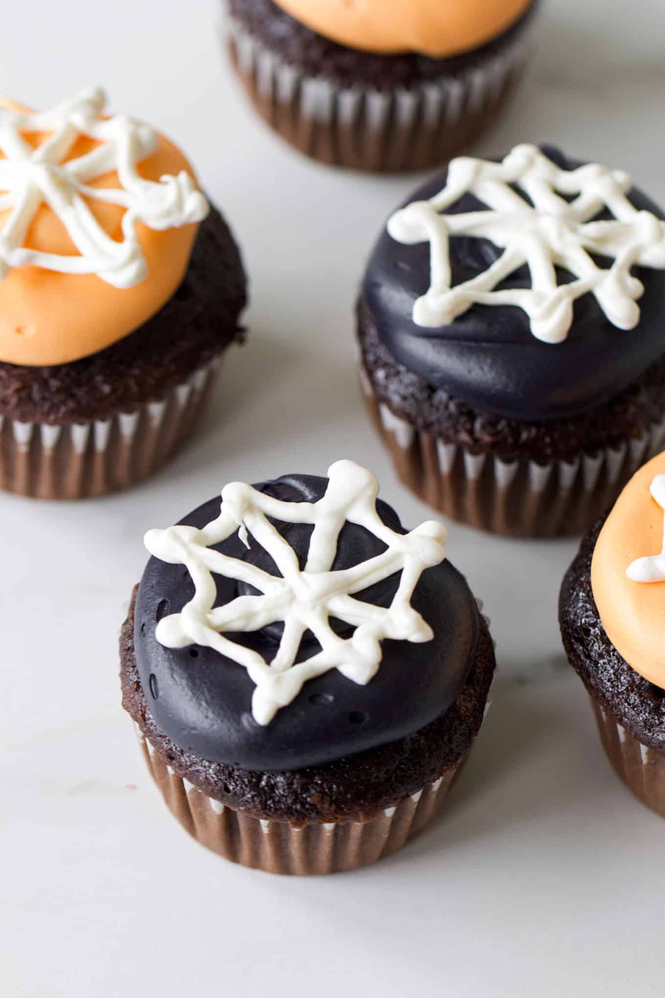 Easy Halloween Cupcake Ideas: Candy Melt Spiderweb Cupcakes