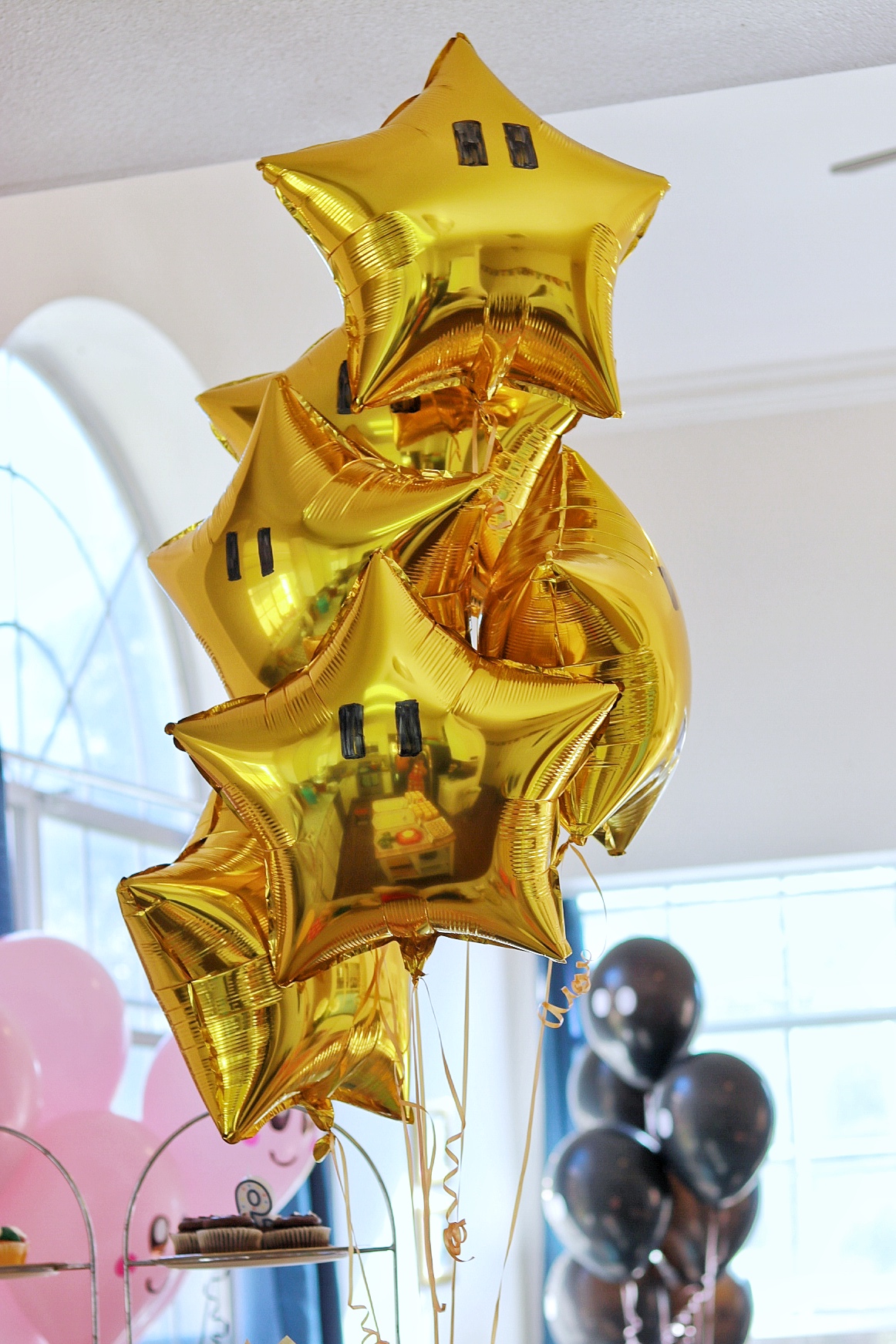 easy diy star balloons for a super mario birthday party