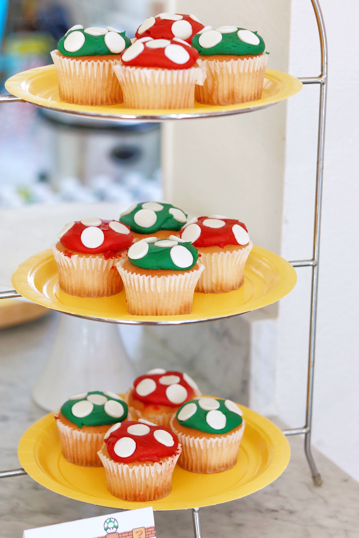 cupcakes decorated like mushrooms for a Mario birthday party