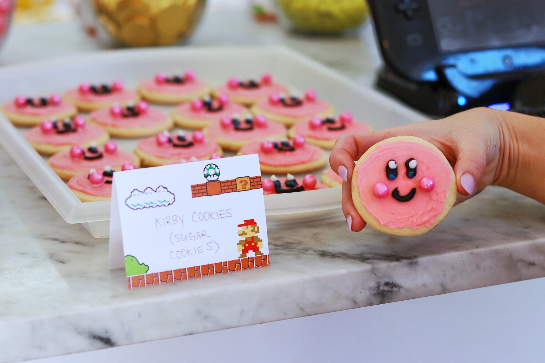 food idea for a Kirby birthday party: pink sugar cookies