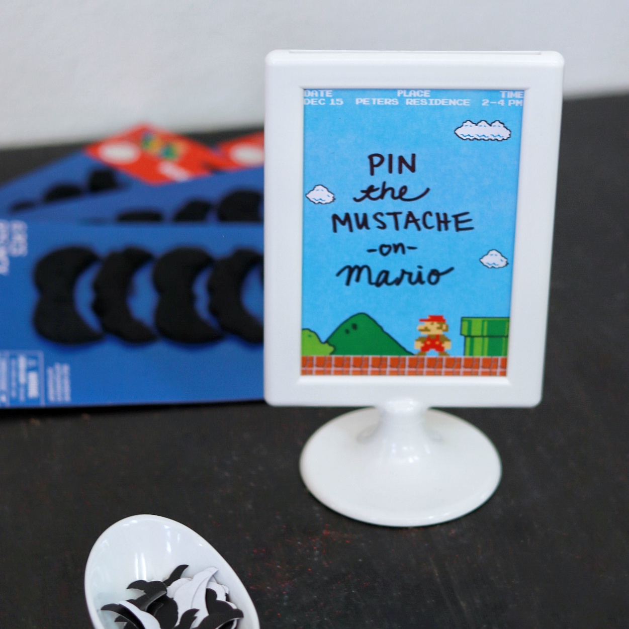 pin the mustache on Mario - birthday party game idea