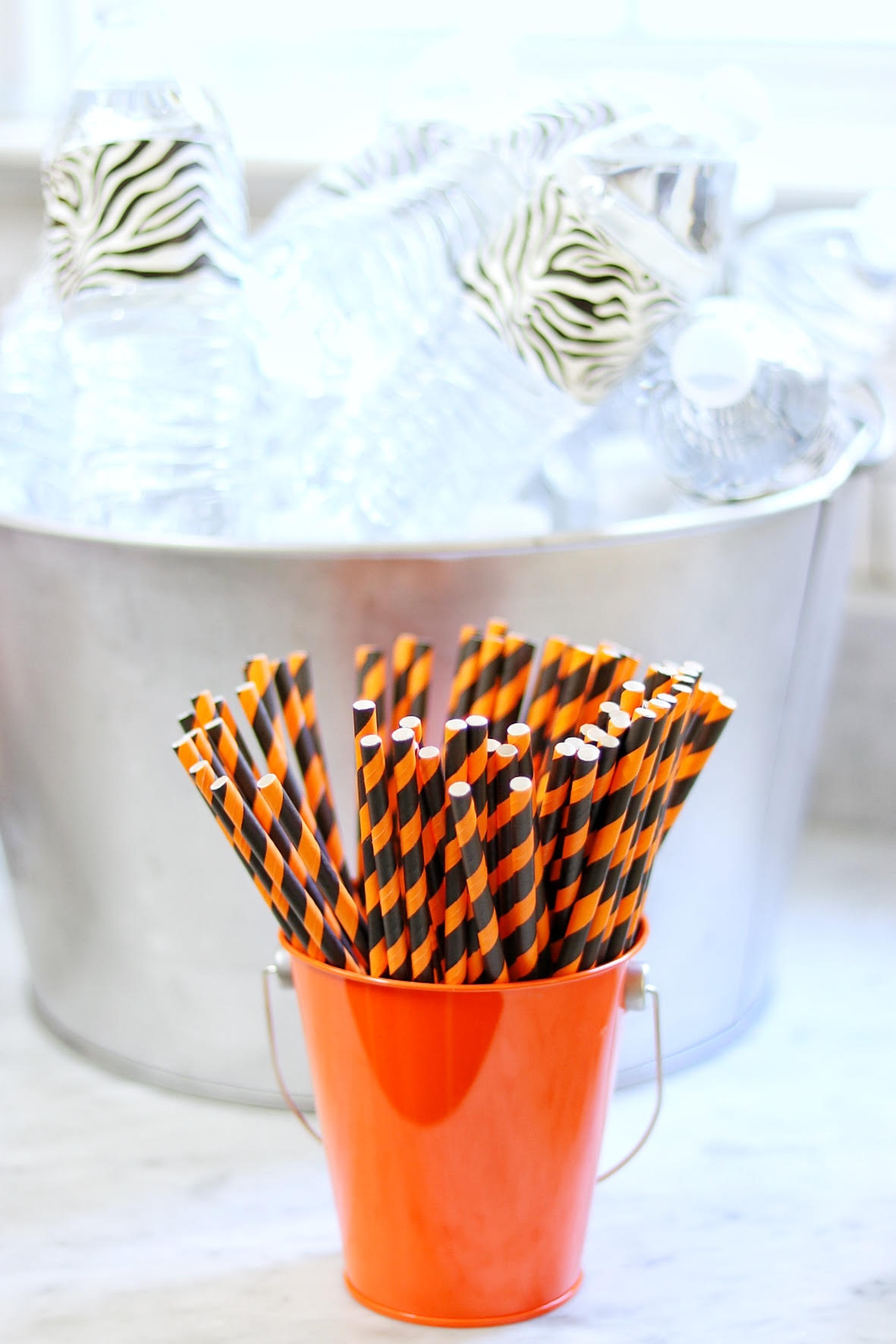paper straws party decoration for a tiger birthday party