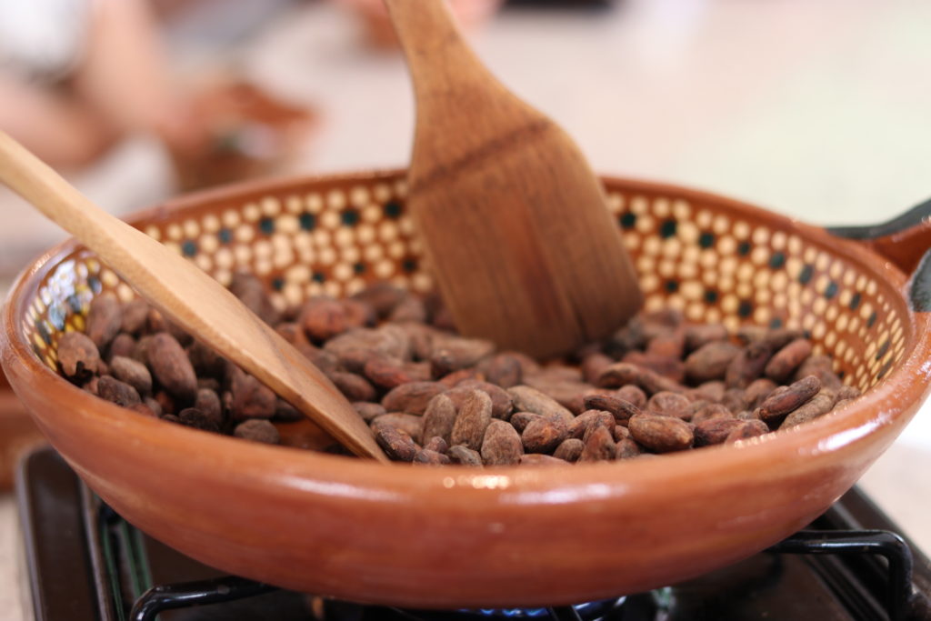 roasting cacao beans at chocomuseo in puerto vallarta