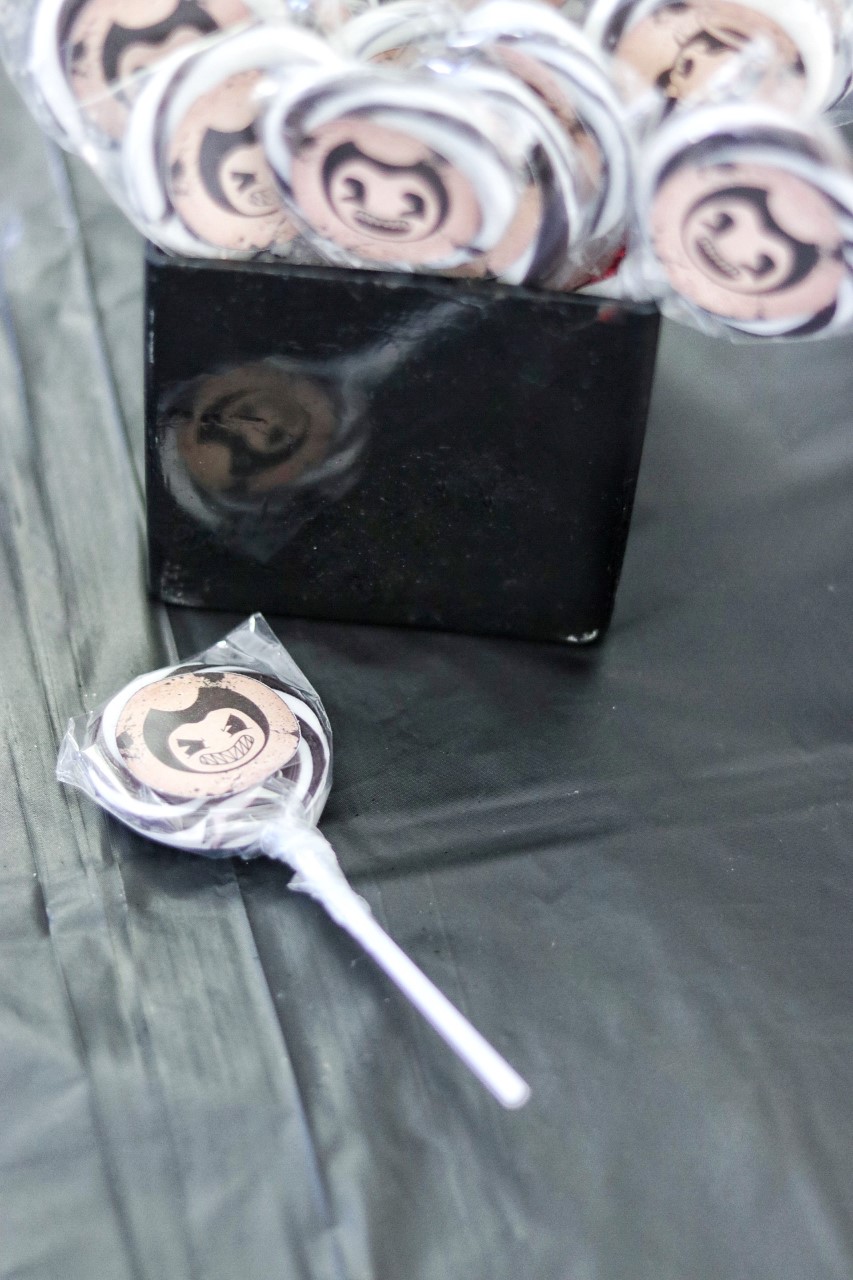 bendy and the ink machine birthday party favors: black and white lollipops