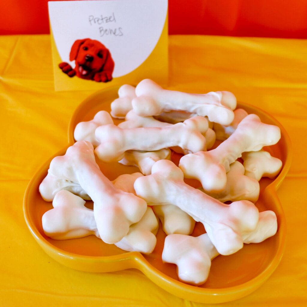 Clifford the Big Red Dog birthday party food: Candy Melt and Pretzel "Bones"