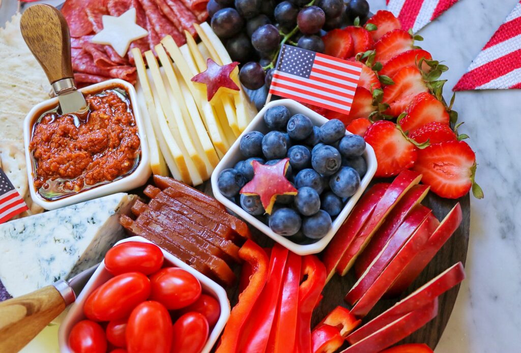 Patriotic red white and blue charcuterie board for 4th of July