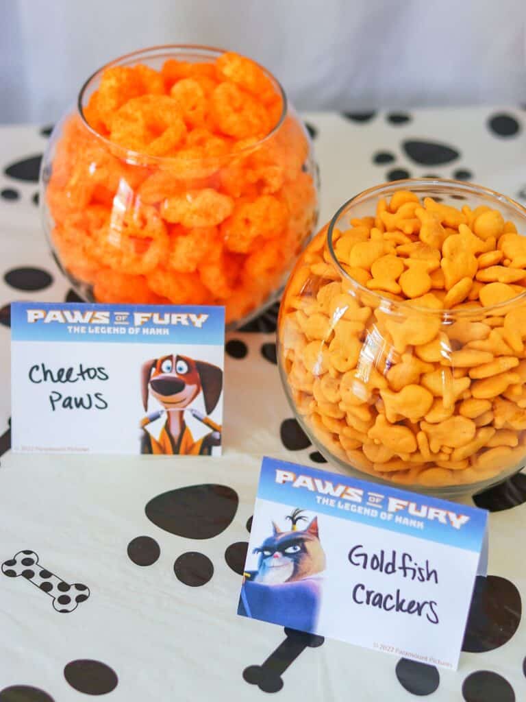 cat and dog party food idea: Goldfish Crackers and Cheetos Paws served in fishbowls