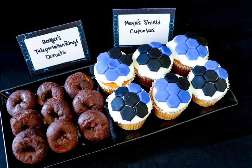 Secret Headquarters Watch Party Food Ideas: Treat Trays with Foods Inspired by Secret Headquarters Powers (Berger's Teleportation Rings Donuts and Maya's Shield Cupcakes)