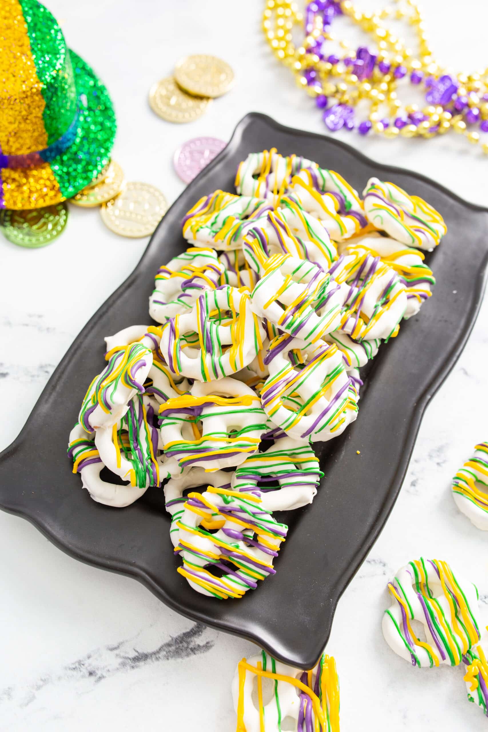 family-friendly Mardi Gras food idea: Mardi Gras Candy Melt Pretzels