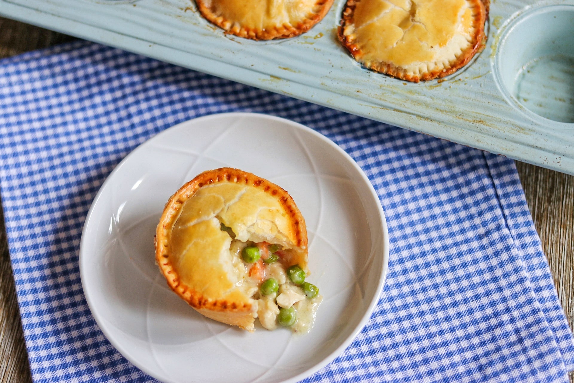 individual pot pies: chicken pot pie in muffin tins with pie crust