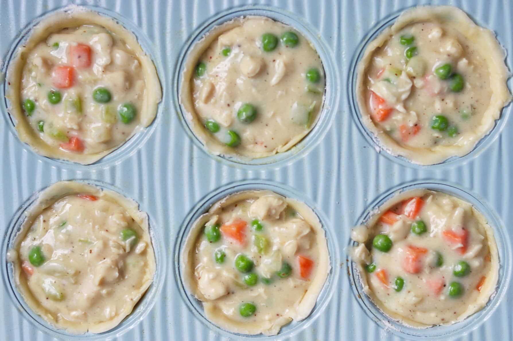 recipe for chicken pot pies in a muffin tin