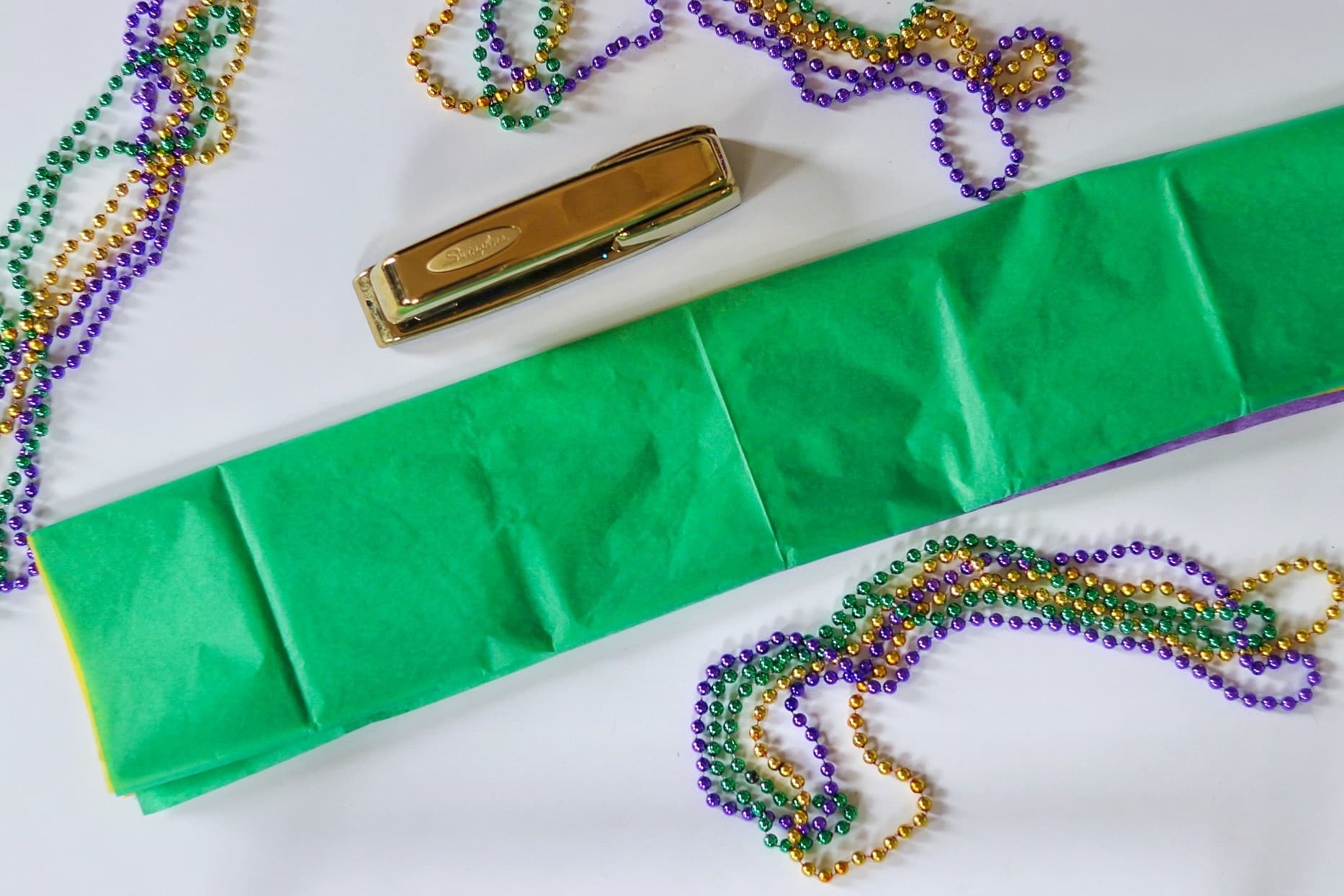 DIY Mardi Gras garland made from tissue paper