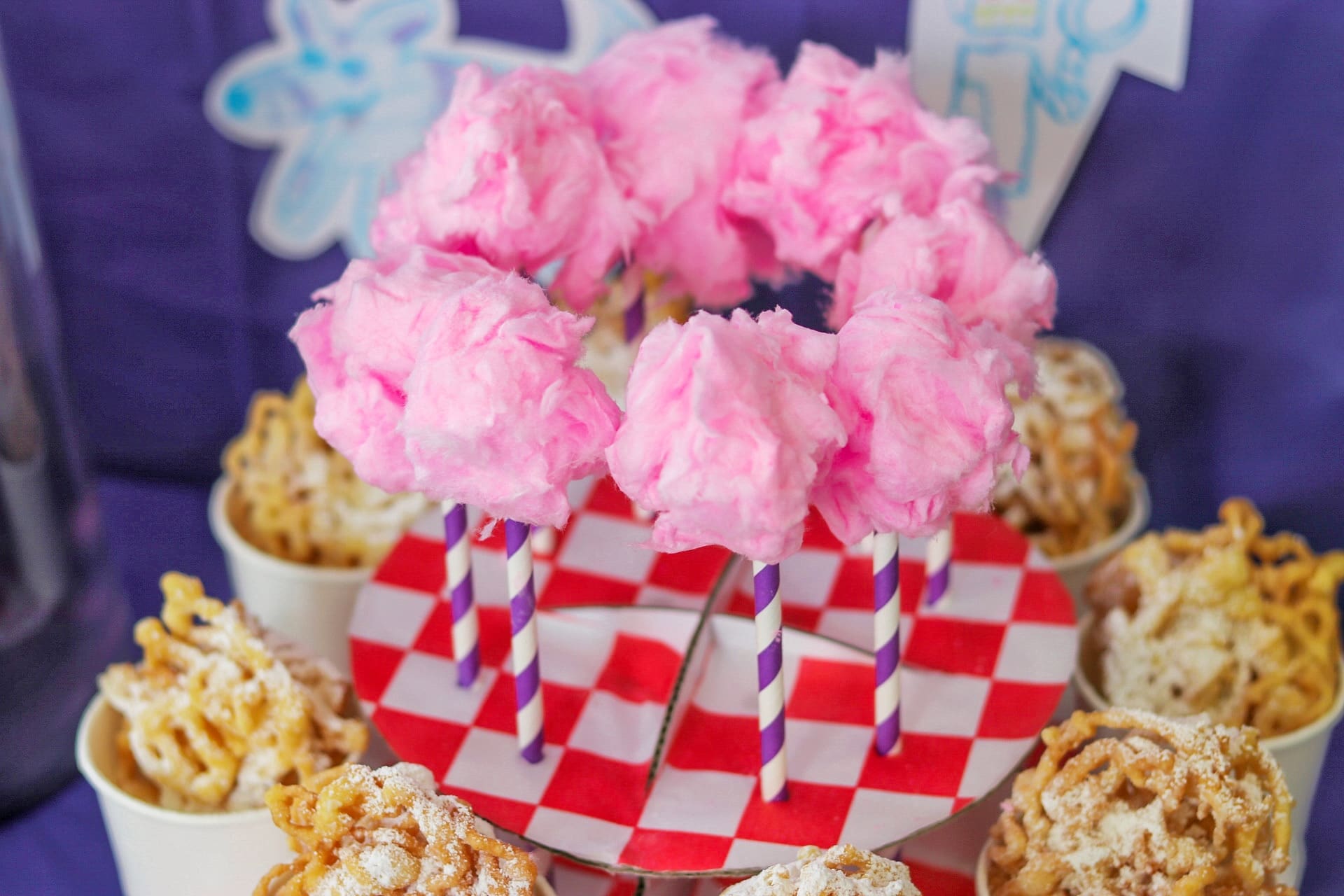 Food Ideas for a carnival or fair themed party or an IF movie party or carnival themed party: cotton candy pops