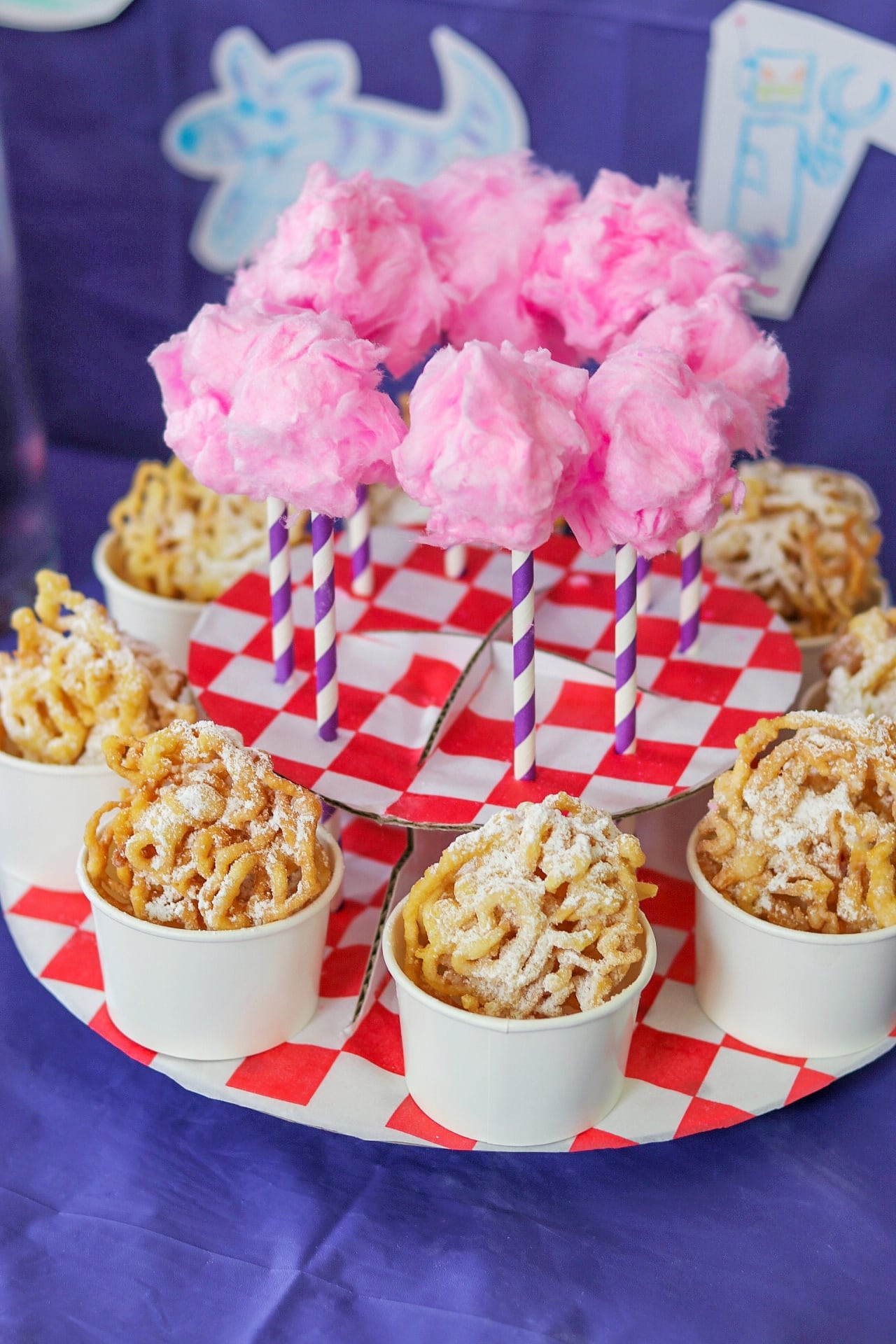 Food Ideas for a fair themed party or an IF movie party or carnival themed party: mini funnel cakes and cotton candy pops