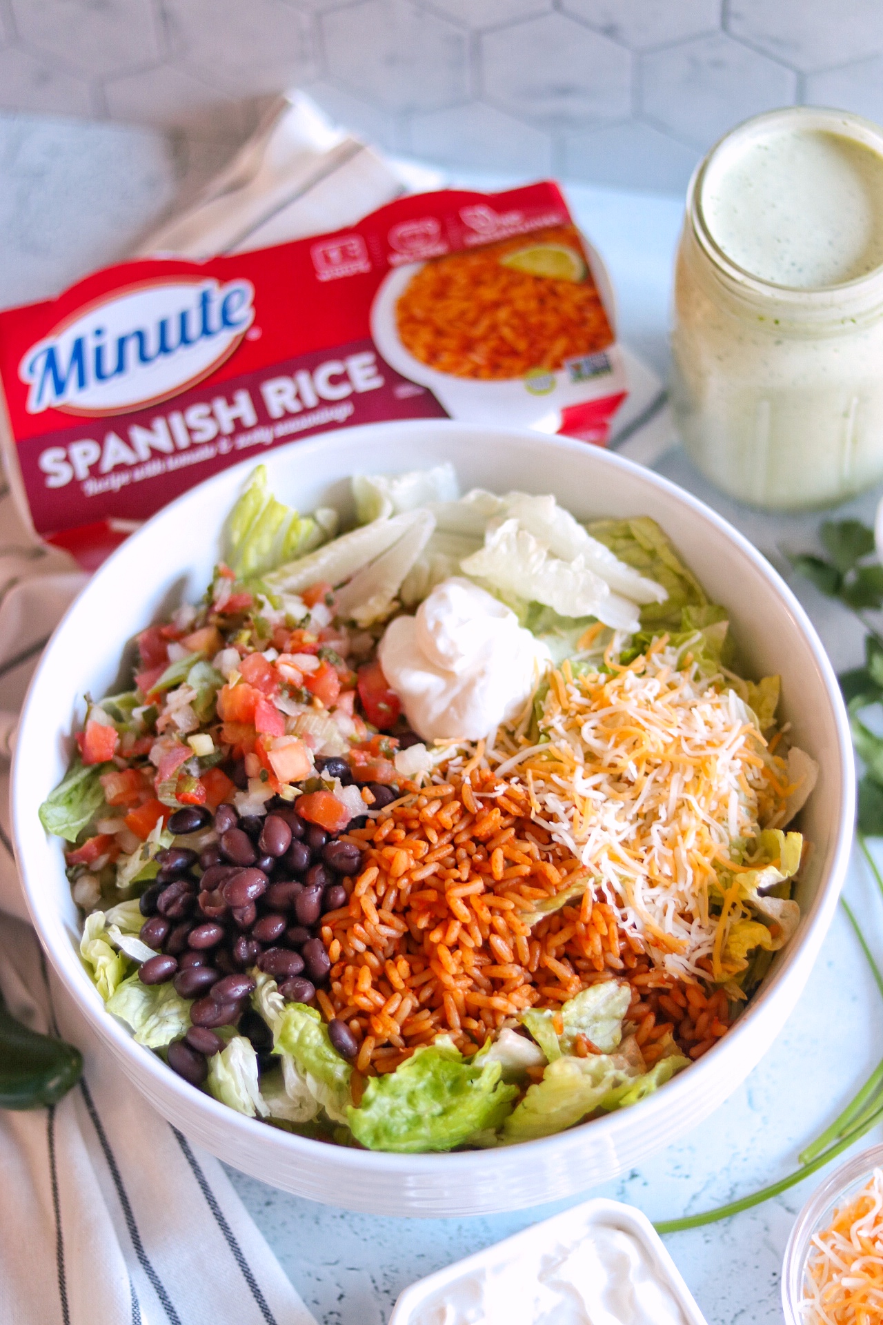 Mexican rice salad recipe with the best creamy cilantro dressing