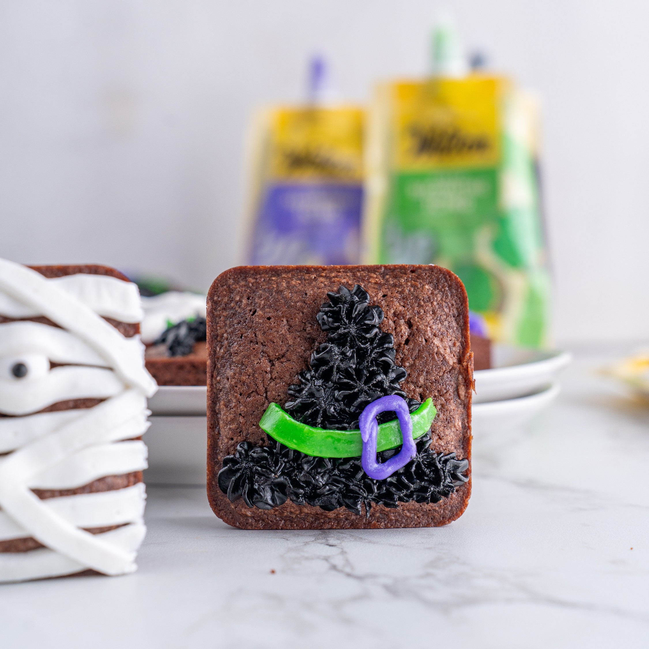 decorating brownies for Halloween