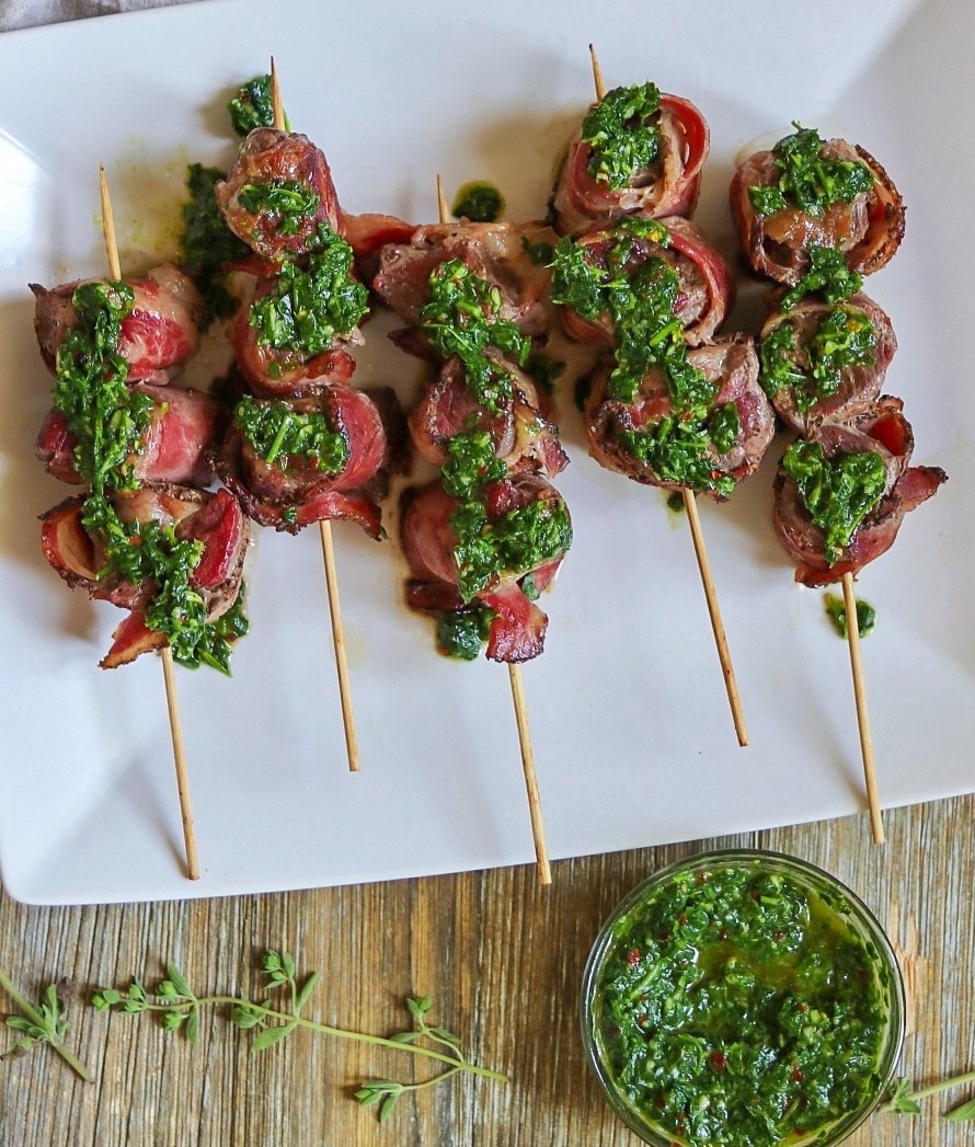 bacon wrapped steak bites recipe with garlic chimichurri