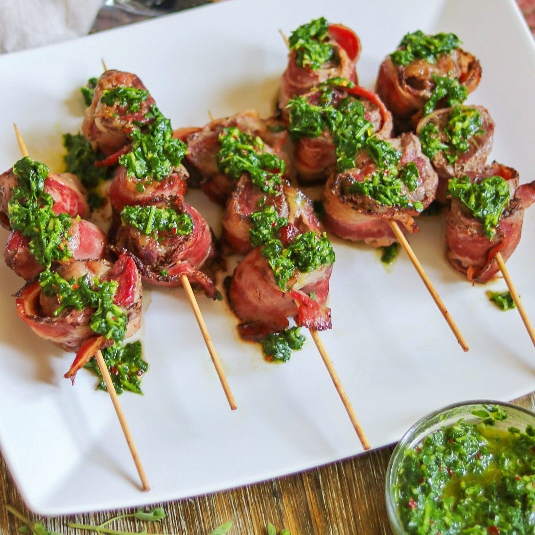 bacon wrapped beef skewers with a homemade garlic chimichurri recipe