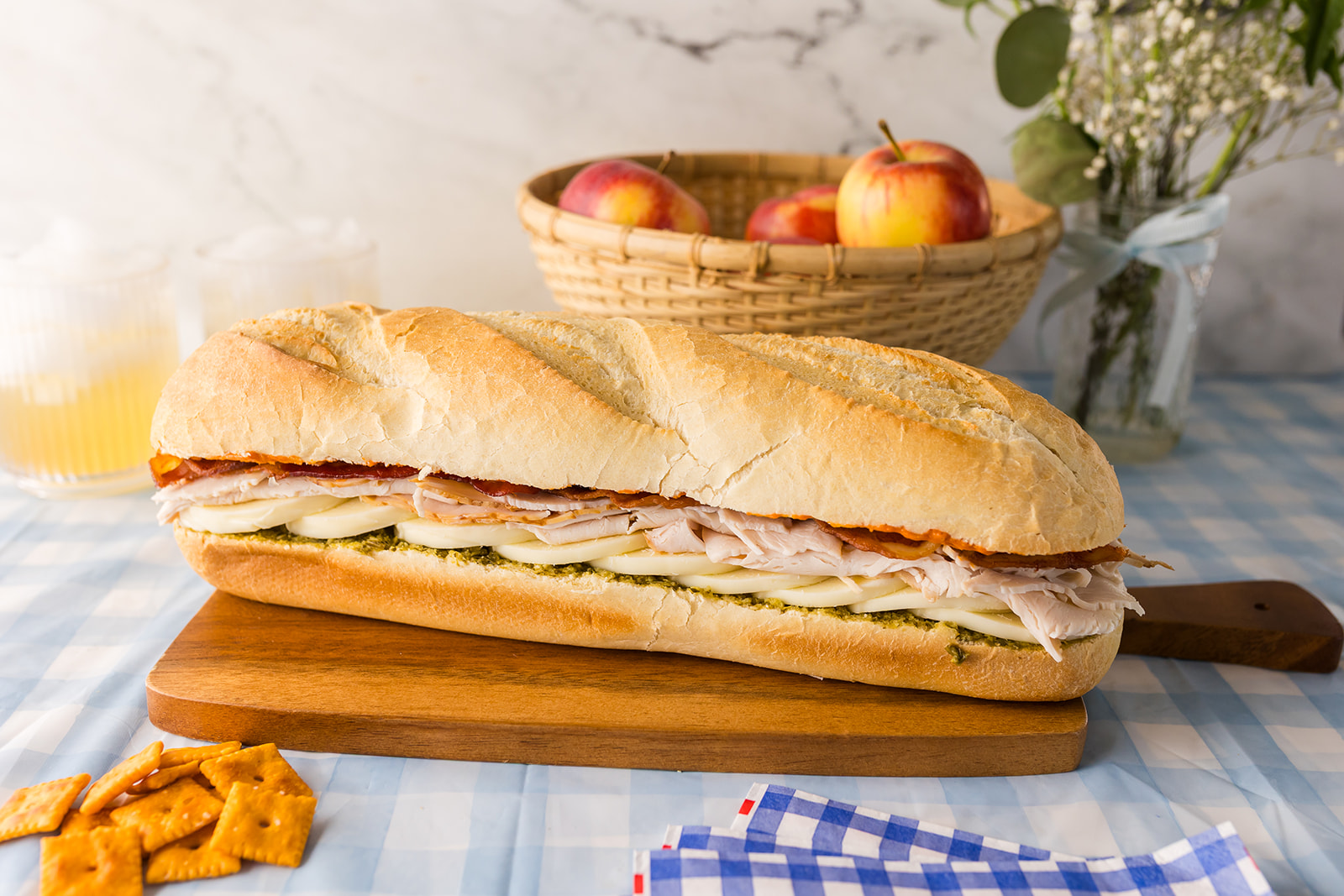 loaf sandwich recipes: Tote-and-Slice Turkey, Bacon, and Pesto Loaf Sandwiches