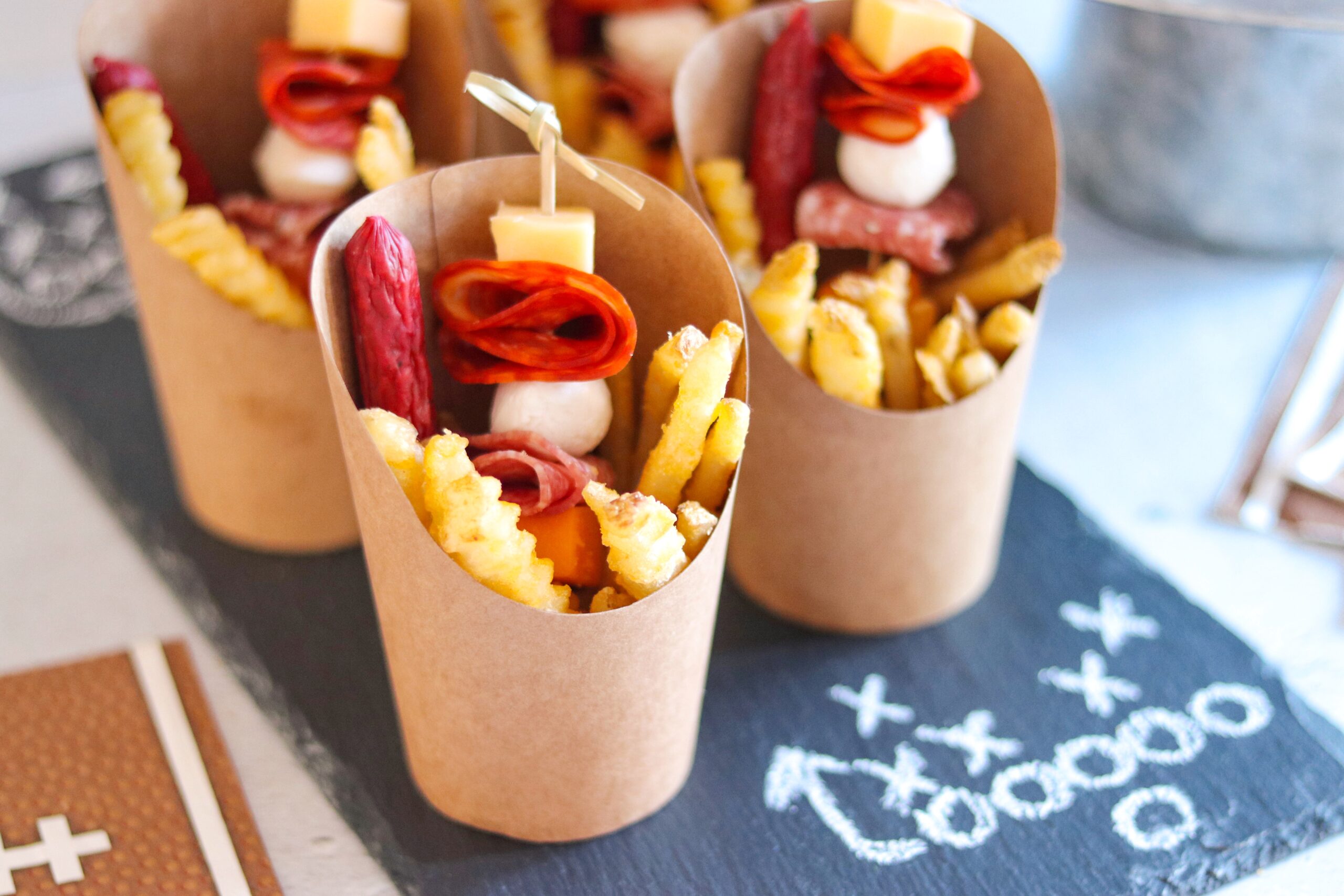 French fry charcuterie board idea: football charcuterie cups
