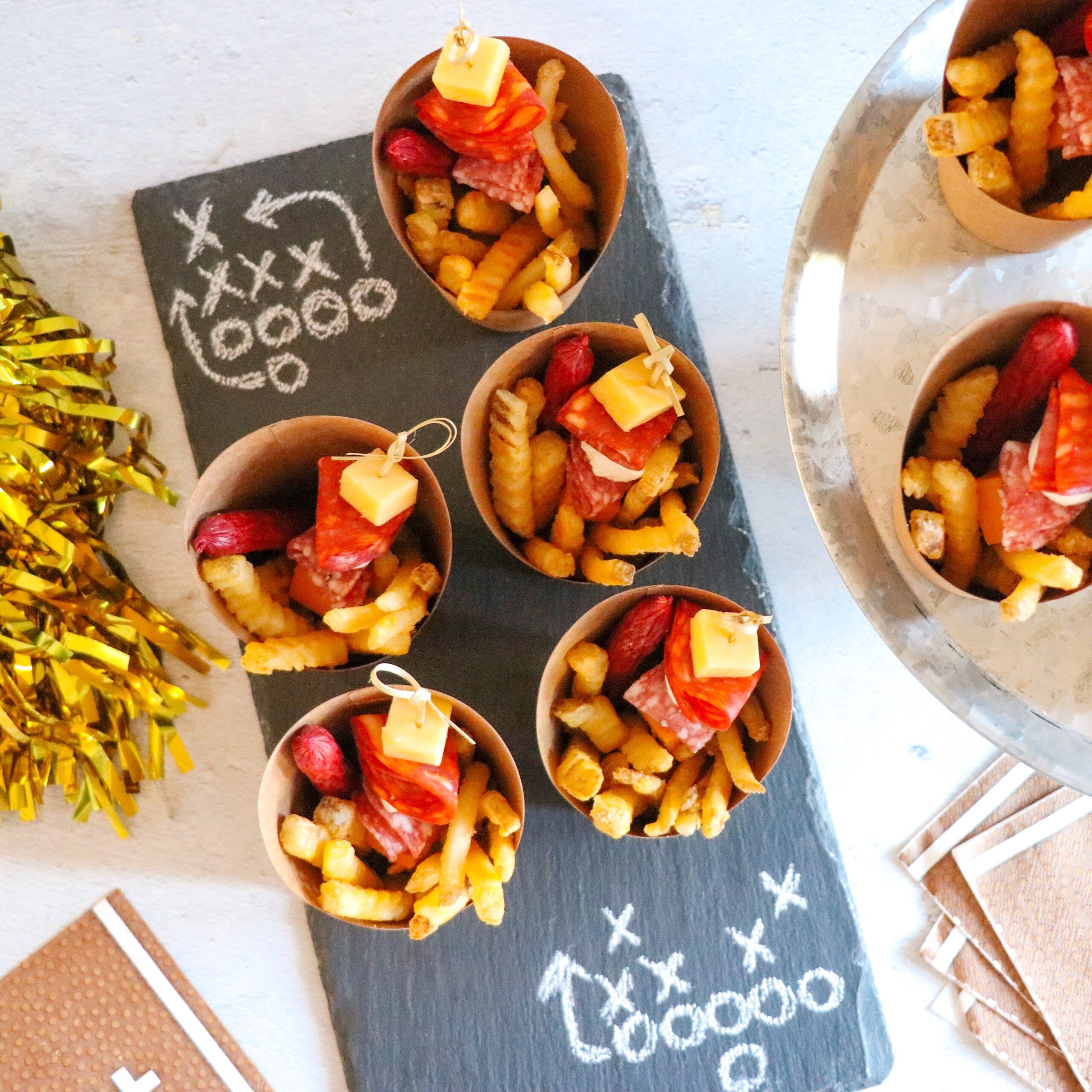 individual charcuterie cups with french fries for football party