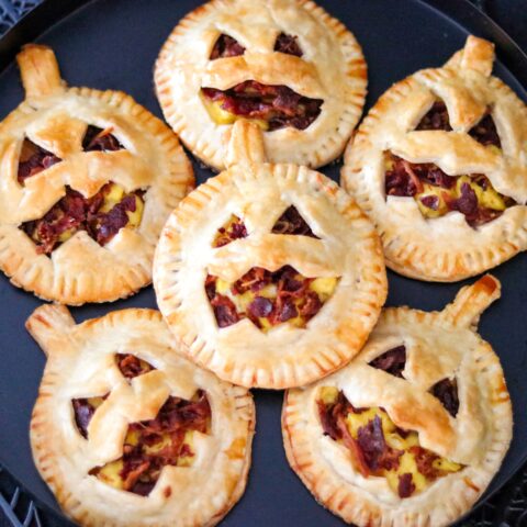 Jack-O-Lantern Breakfast Hand Pies (savory Halloween breakfast ideas)